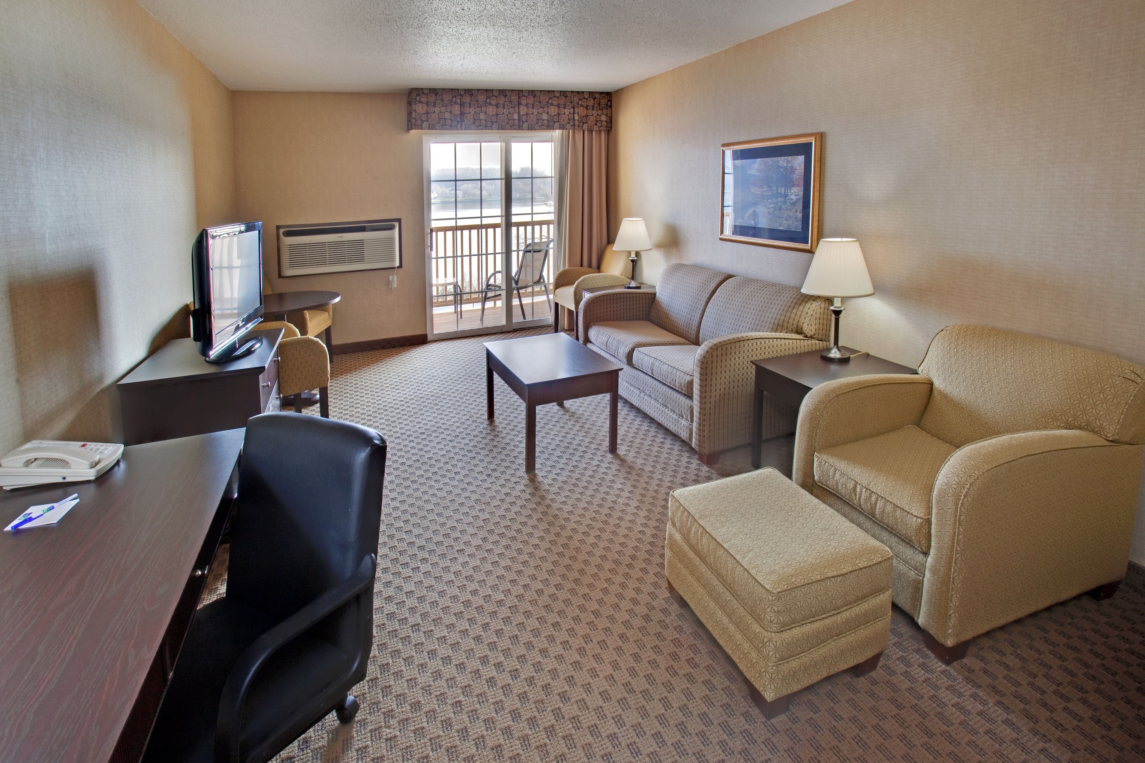 suite, 1 bedroom, river view | premium bedding, down duvets, in-room safe, desk