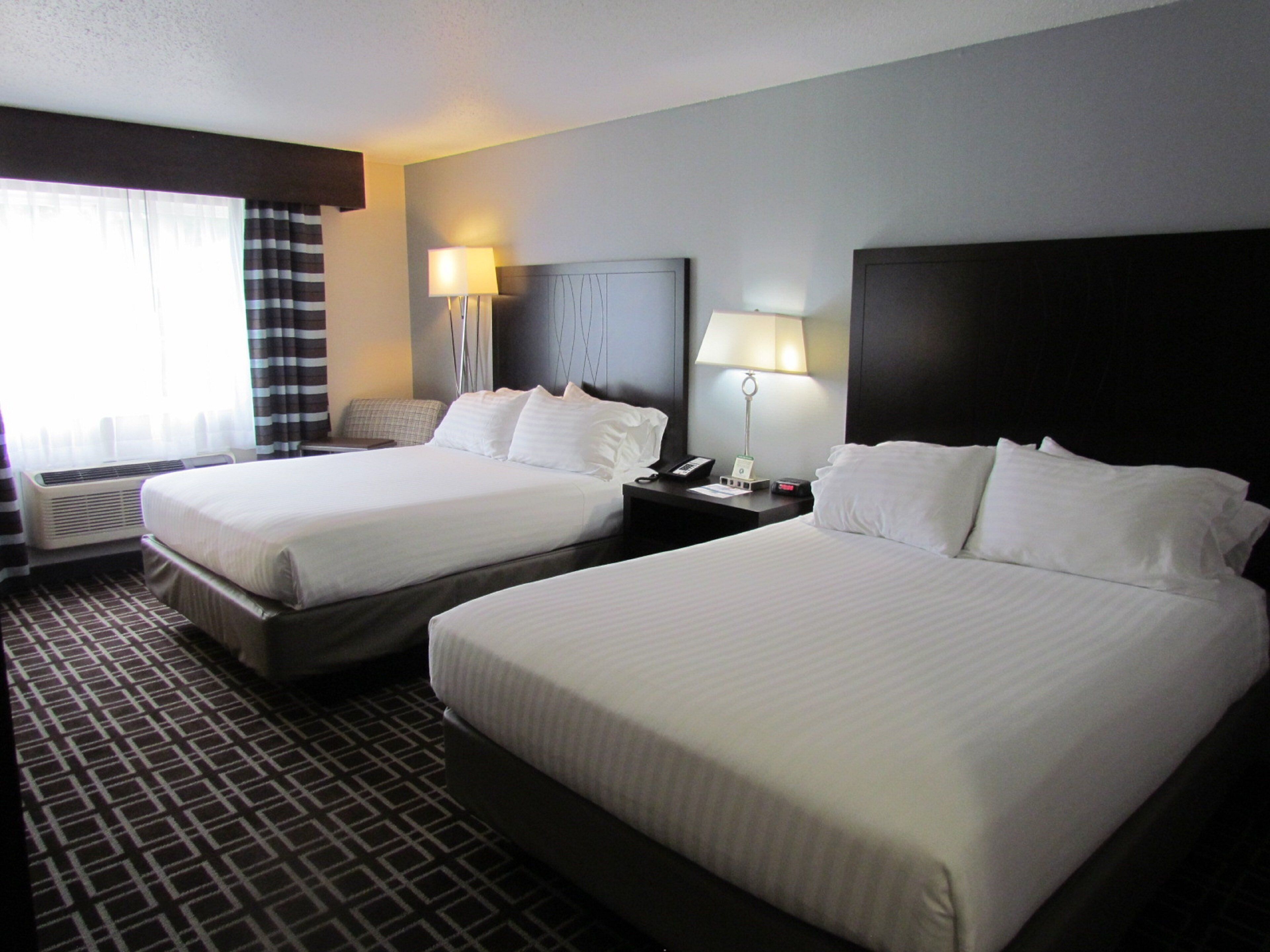 Premium bedding, down duvets, in-room safe, desk