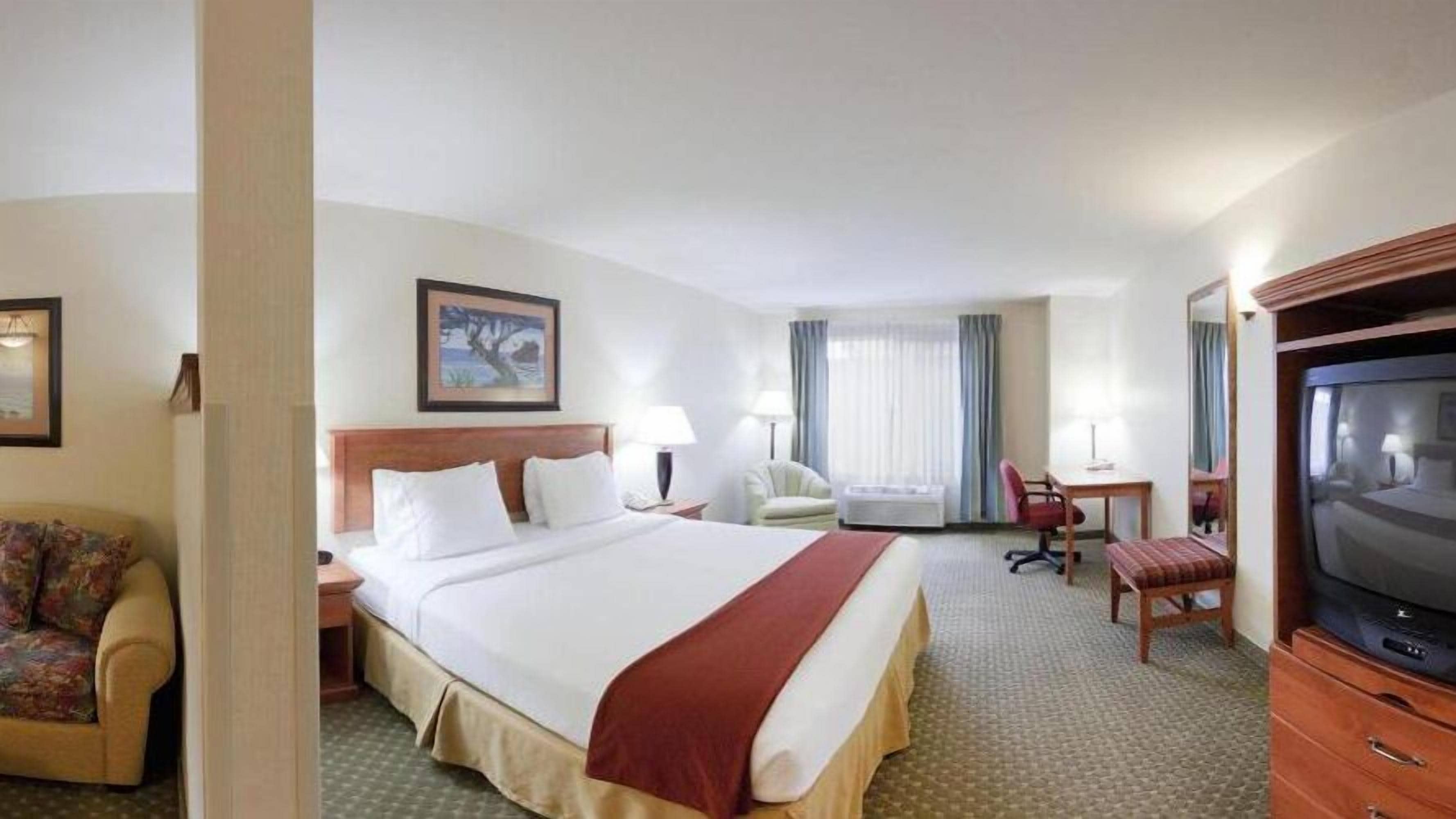 desk, laptop workspace, blackout curtains, iron/ironing board