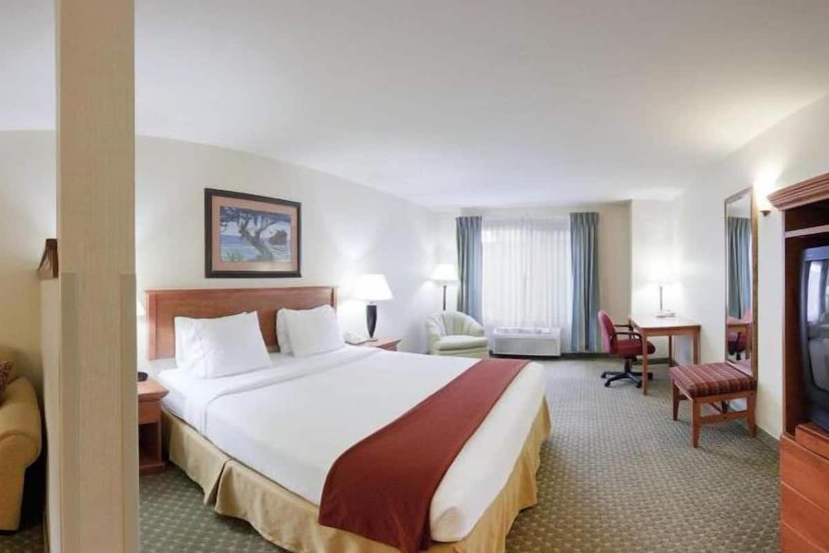 desk, laptop workspace, blackout curtains, iron/ironing board