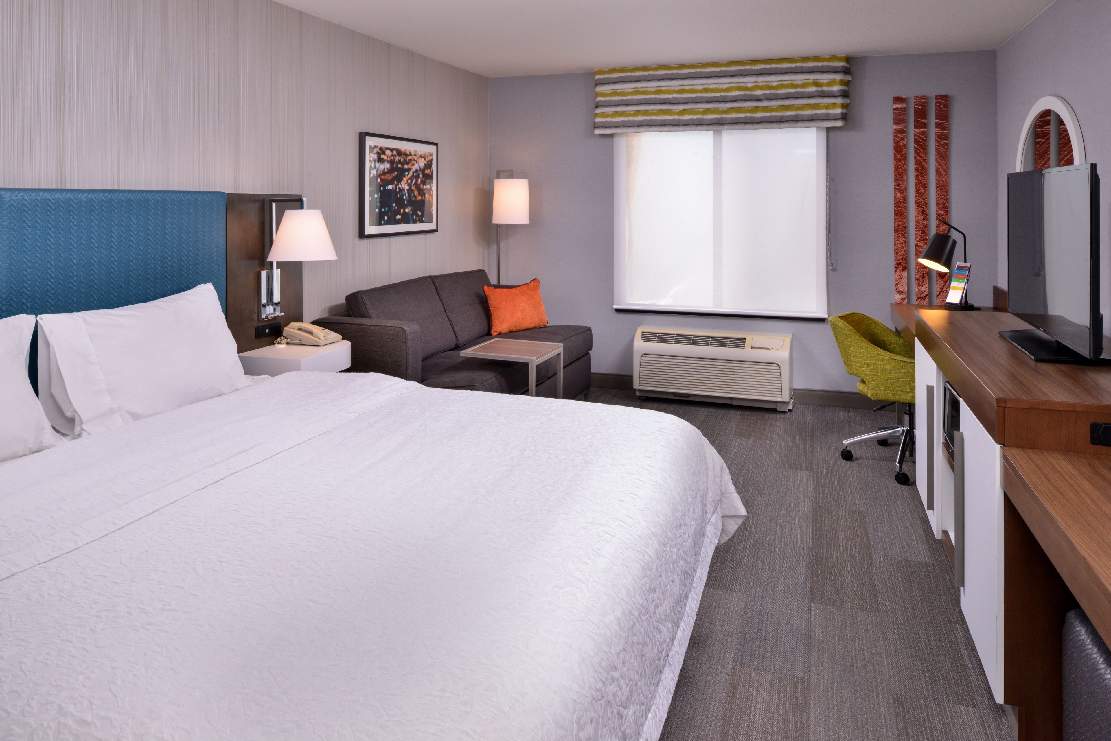 one king studio suite | hypo-allergenic bedding, desk, laptop workspace, blackout curtains