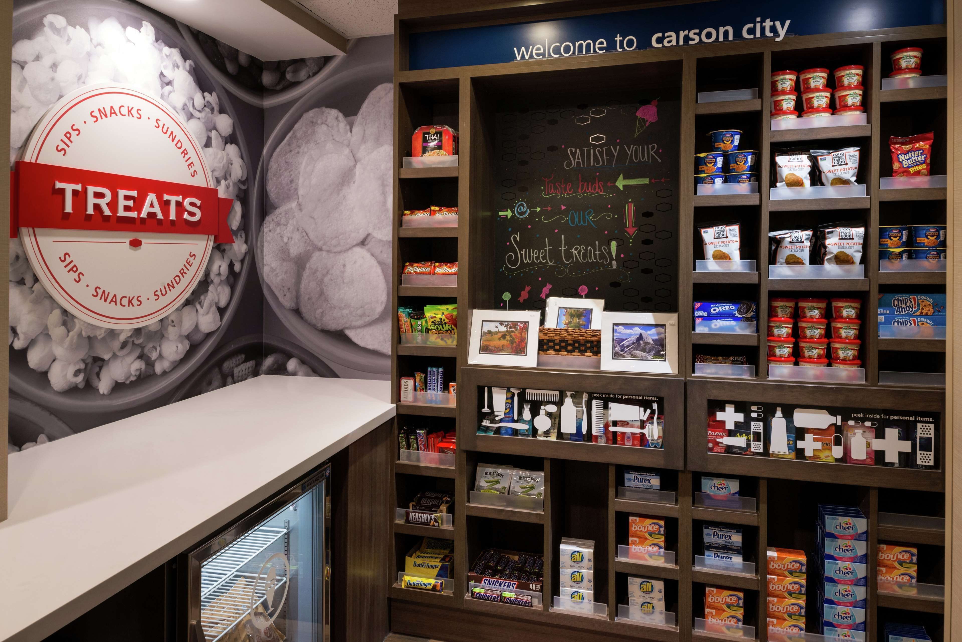 A store with shelves stocked with various treats and snacks.