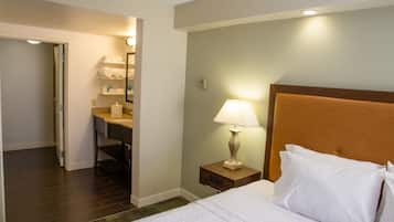 Premium bedding, desk, laptop workspace, blackout curtains