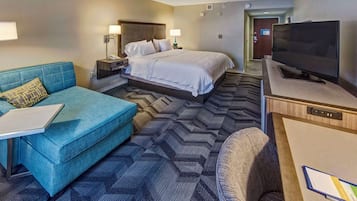 Premium bedding, desk, laptop workspace, blackout curtains