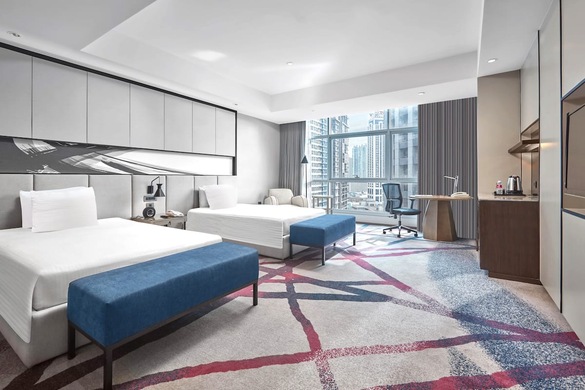 Premium bedding, pillow-top beds, minibar, in-room safe