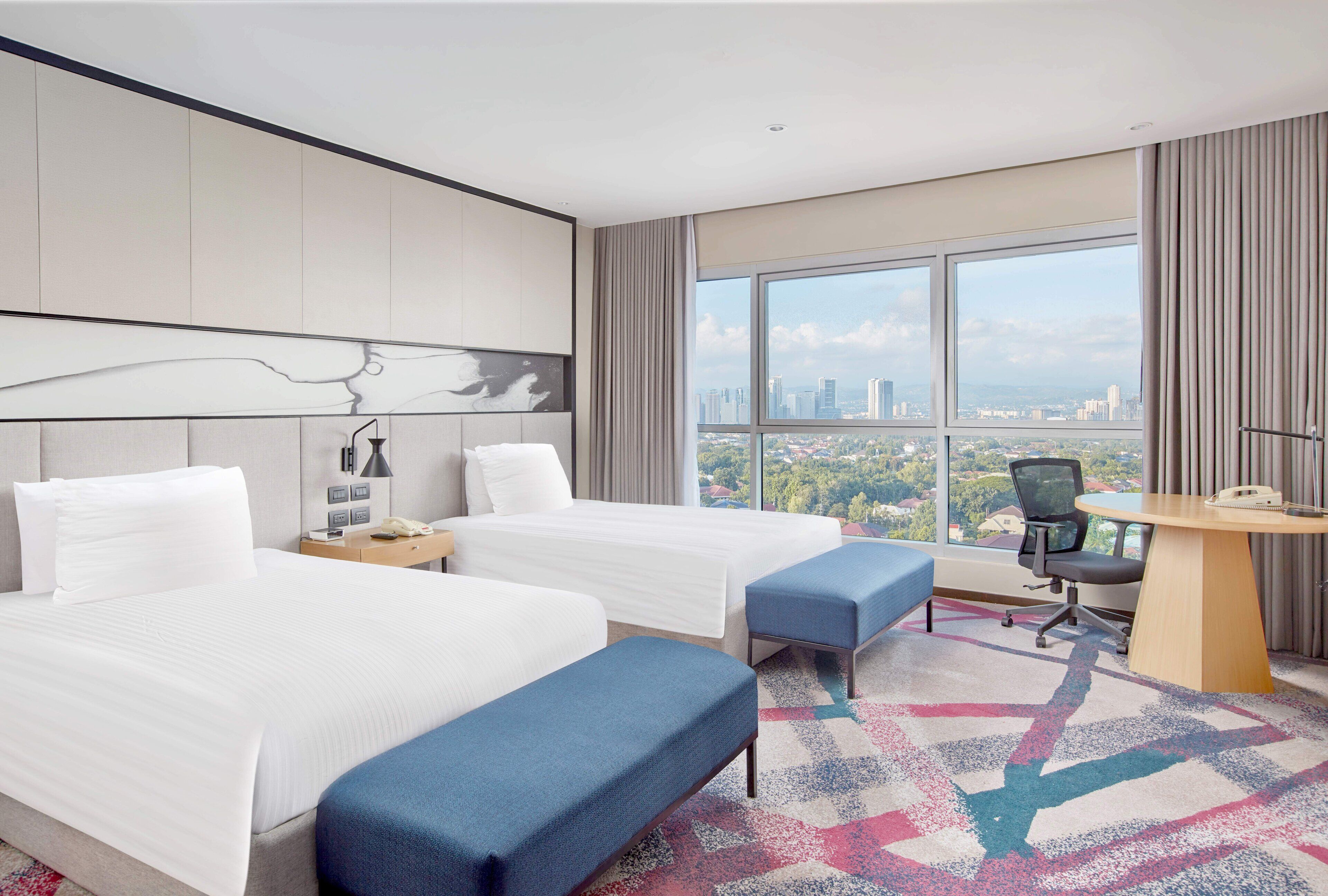 Premium bedding, pillow-top beds, minibar, in-room safe