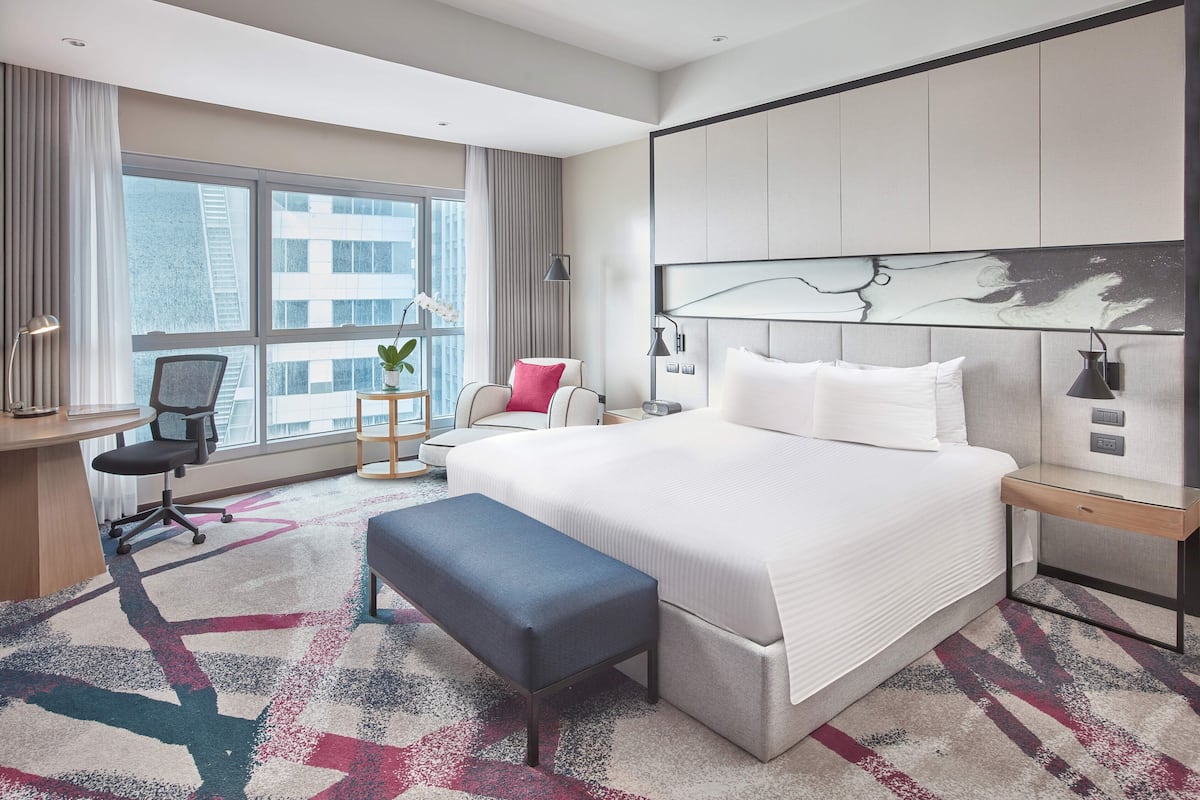 Premium bedding, pillow-top beds, minibar, in-room safe