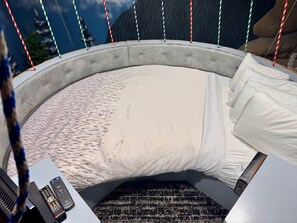 Up Up and Away, 1 Queen Bed ( Half Moon Shaped) (Main Floor)