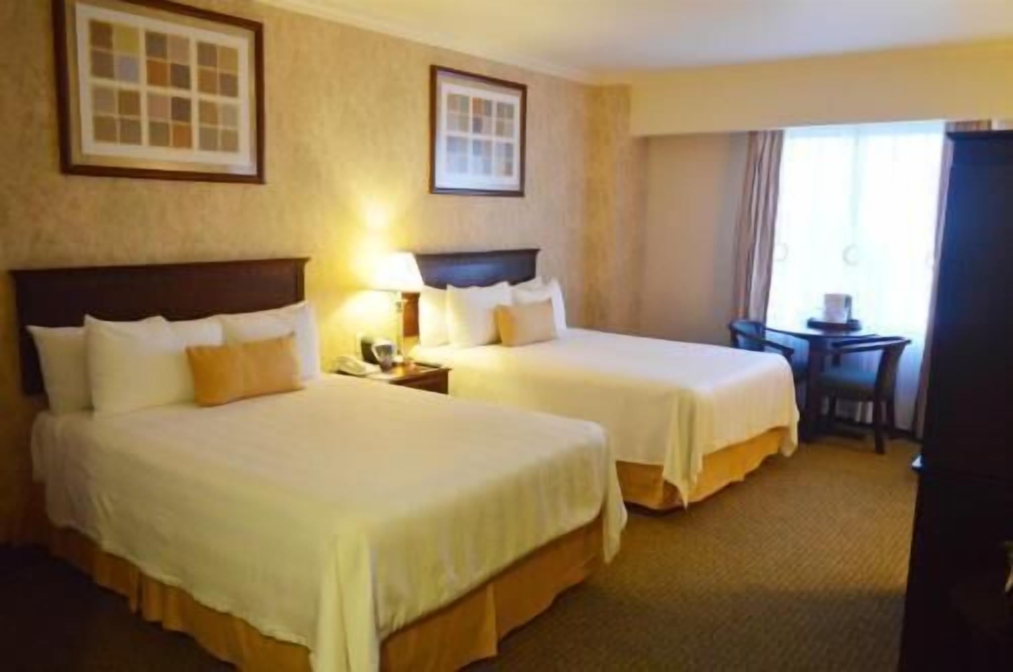 In-room safe, desk, blackout curtains, iron/ironing board