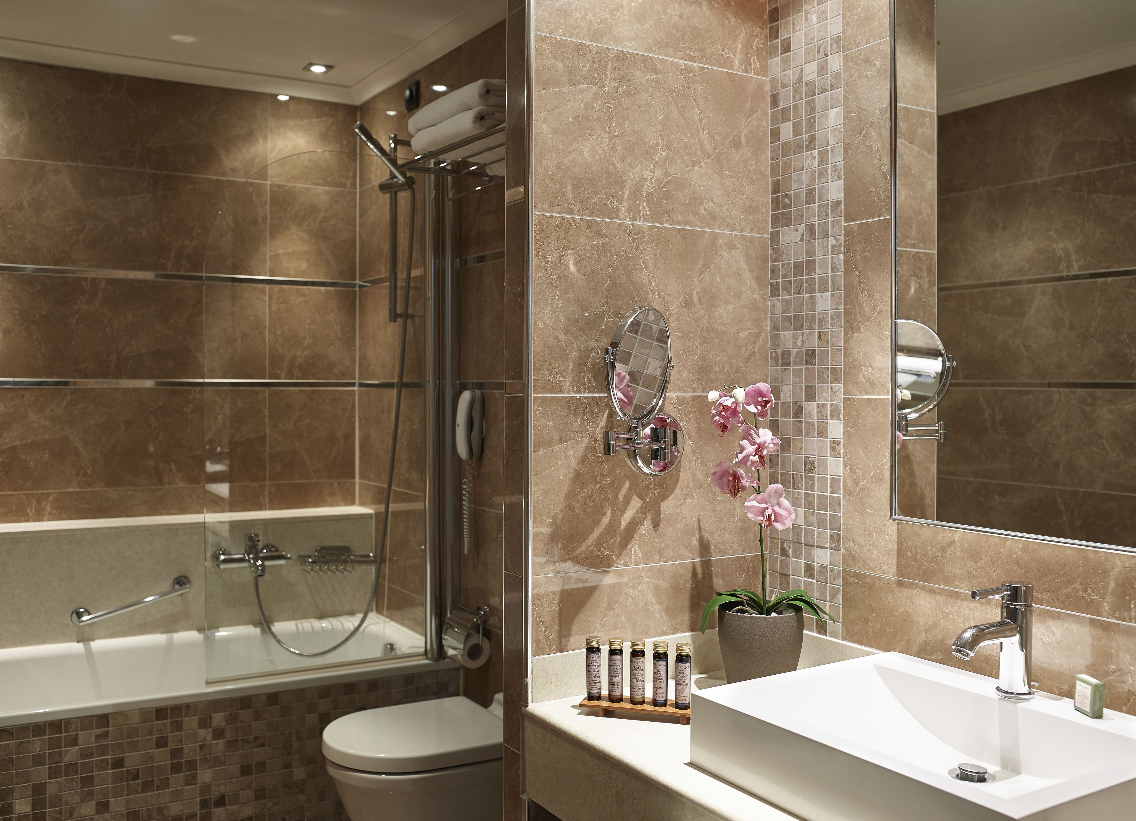 shower, designer toiletries, hair dryer, bathrobes