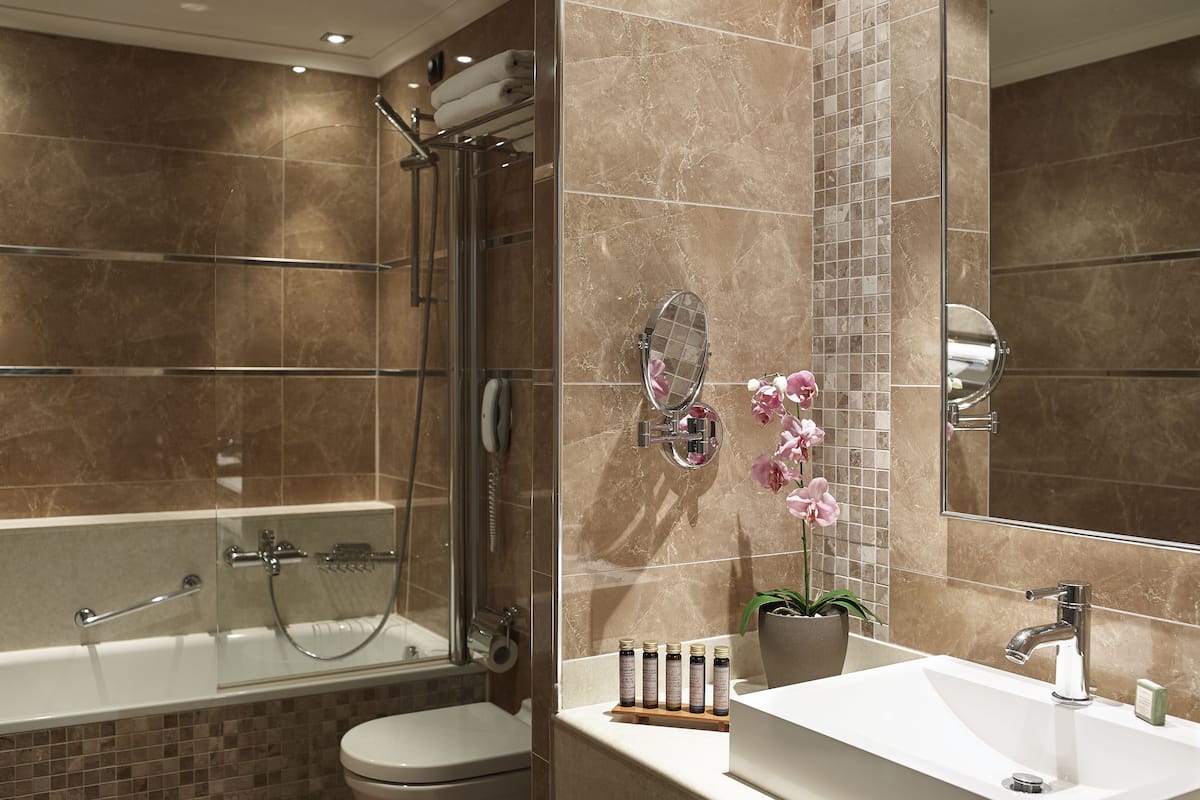 shower, designer toiletries, hair dryer, bathrobes