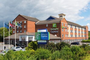 A Holiday Inn Express hotel with a brick facade, multiple windows, and a prominent sign. - Holiday Inn Express Newcastle Gateshead by IHG (Newcastle-upon-Tyne)