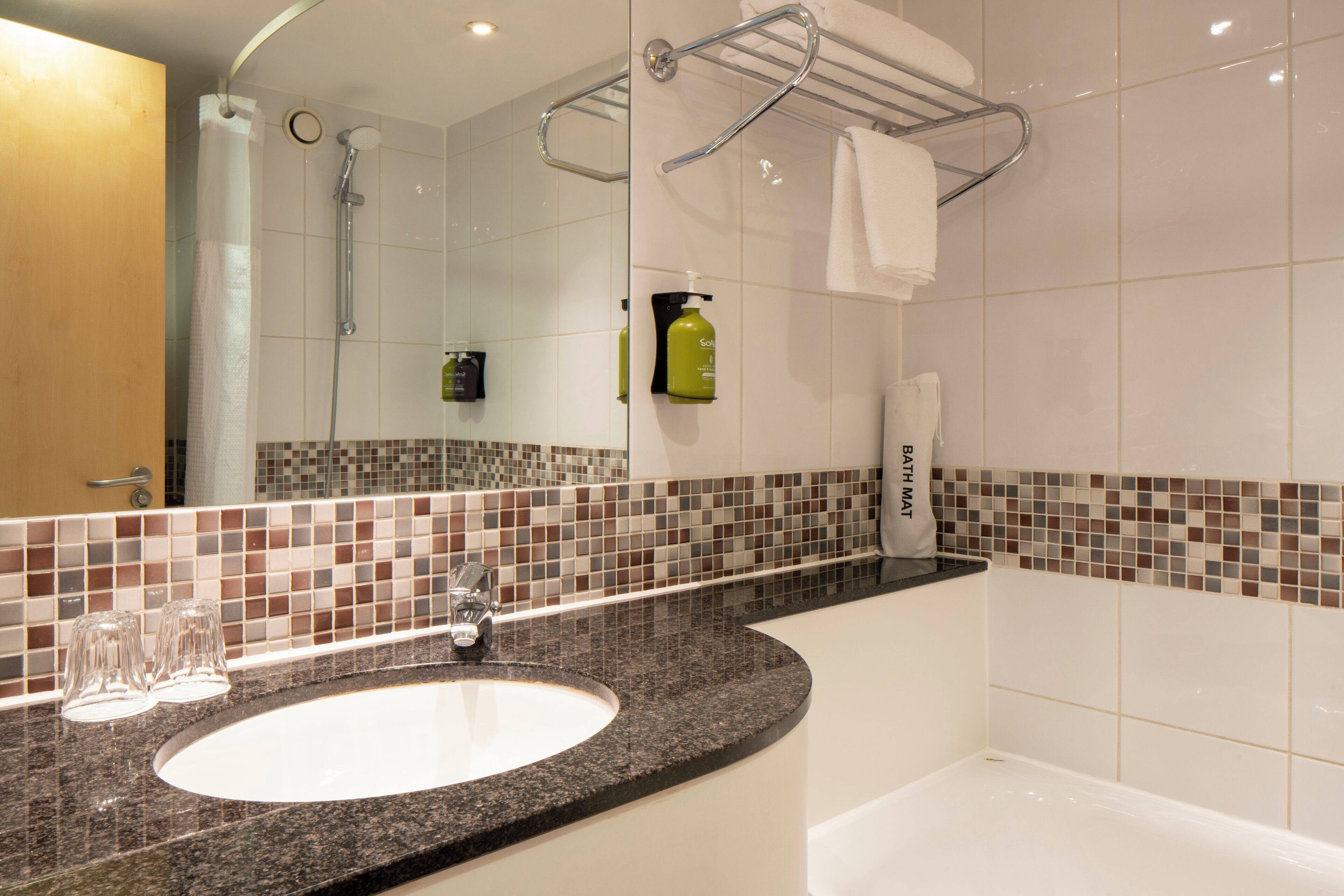 combined shower/bathtub, free toiletries, hair dryer, towels