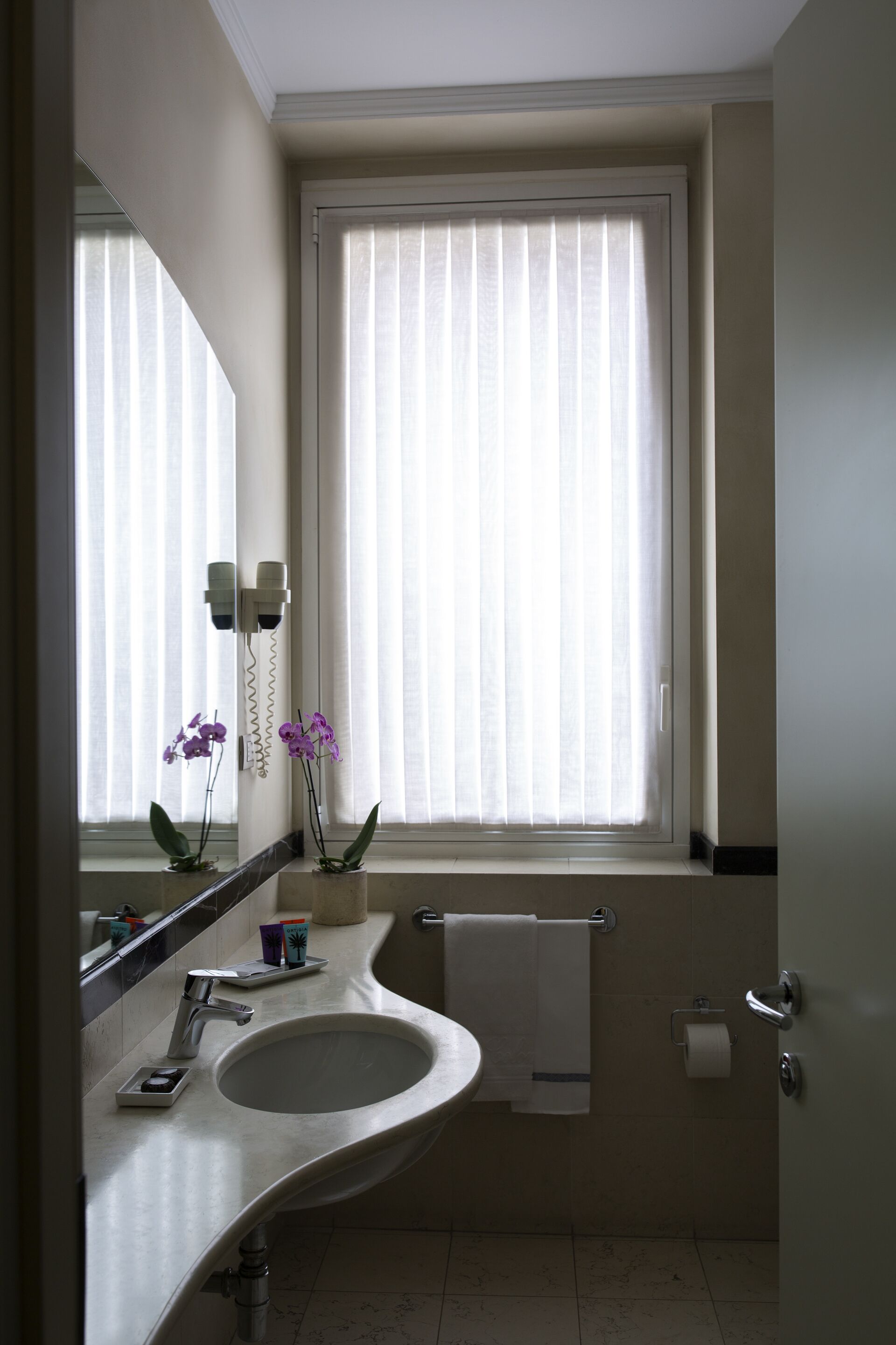 free toiletries, hair dryer, slippers, towels