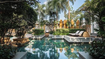 2 outdoor pools, open 6:00 AM to 7:00 PM, pool umbrellas, pool loungers
