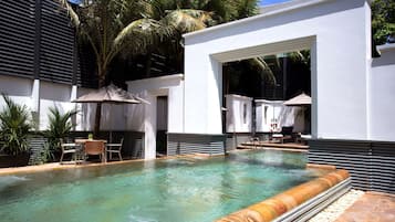 2 outdoor pools, open 6:00 AM to 7:00 PM, pool umbrellas, pool loungers