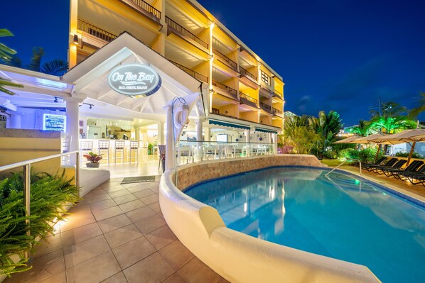 A hotel with a pool, a bar, and a restaurant. - Yellow Bird Hotel (St. Lawrence Gap)