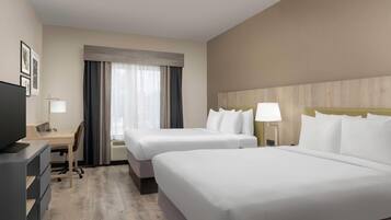 Room, 2 Queen Beds, Non Smoking | Pillowtop beds, desk, laptop workspace, blackout drapes
