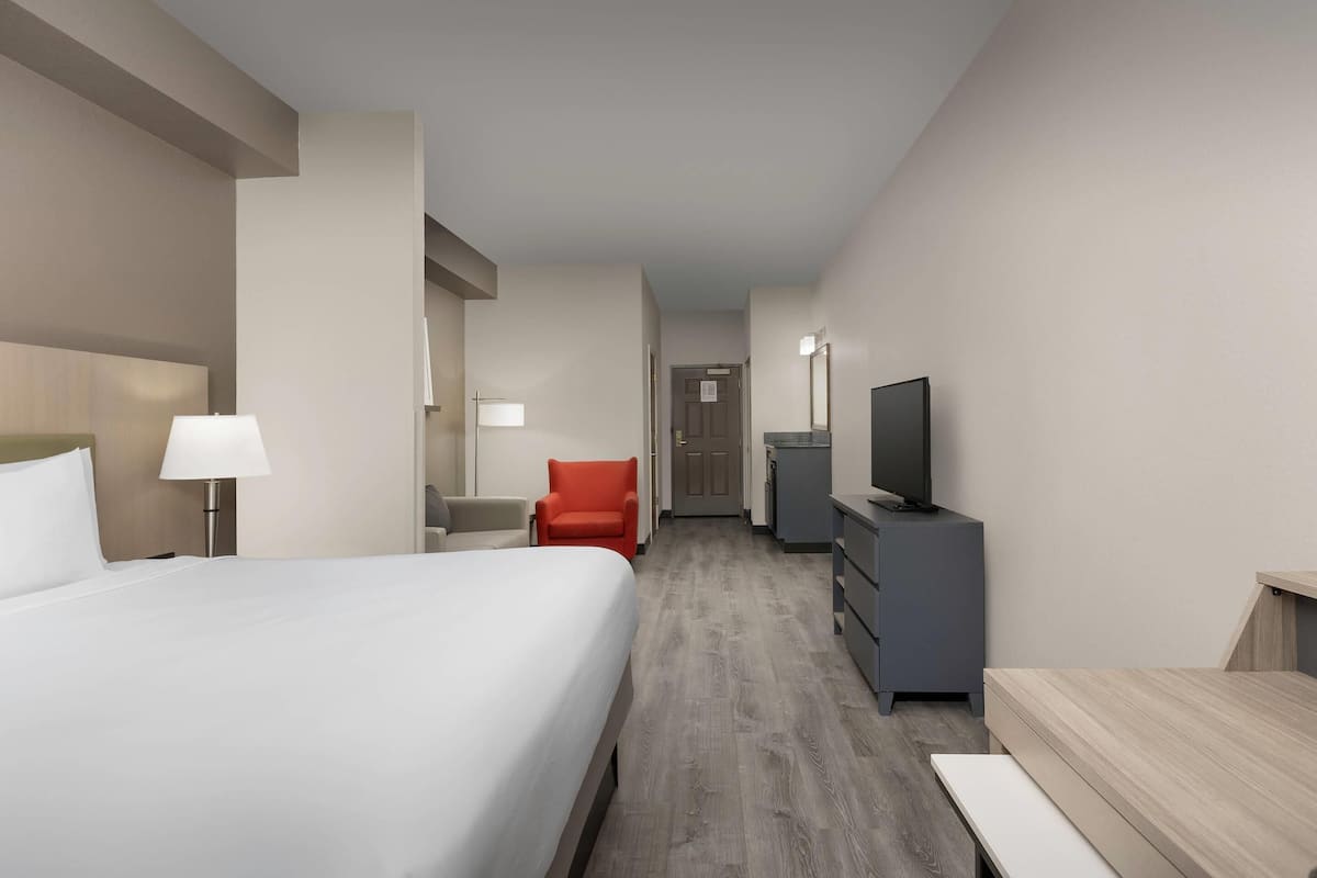 Pillow-top beds, desk, laptop workspace, blackout curtains