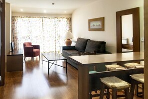 Apartment, 1 Bedroom | Living room | LCD TV