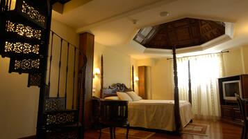 Junior suite | 1 slaapkamer, een minibar, een kluis op de kamer, geluiddichte muren