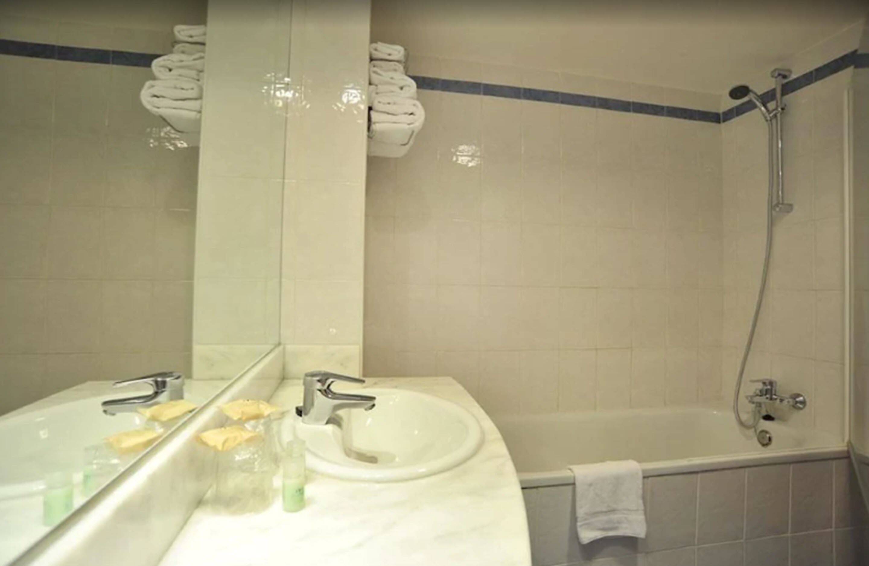 eco-friendly toiletries, hair dryer, towels, soap