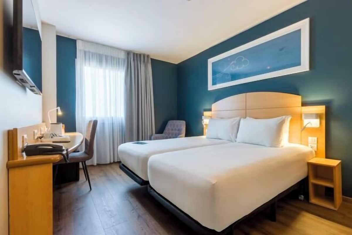 Memory foam beds, desk, blackout drapes, free WiFi