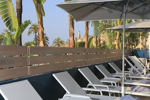 Outdoor pool, pool umbrellas, pool loungers