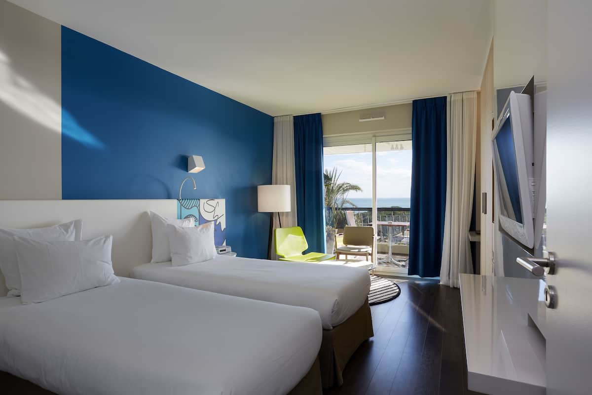 Premium Twin Room, Balcony, Sea View | Hypo-allergenic bedding, free minibar, in-room safe, desk