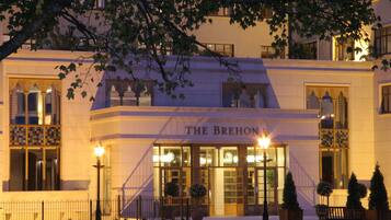 A building with a sign reading "THE BREHON" at the entrance.