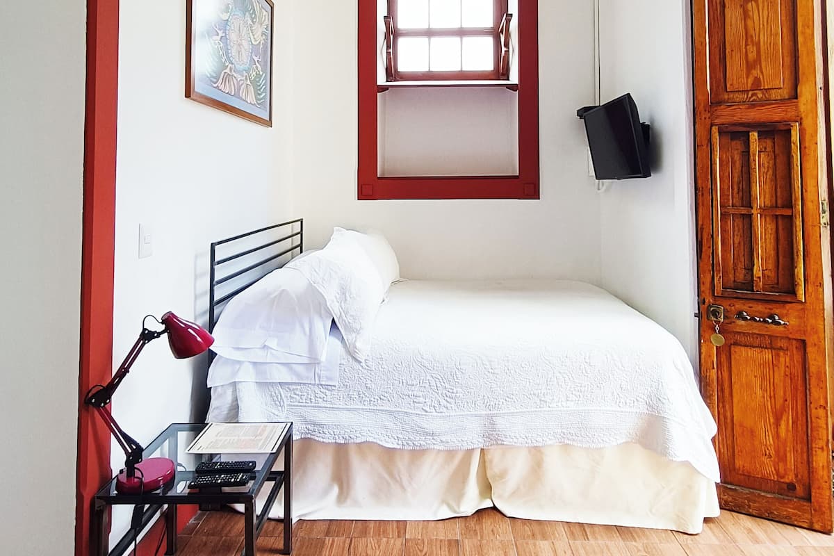 Habitació Comfort | Llençols de cotó egipci, roba de llit d'alta qualitat i cobrellits 
