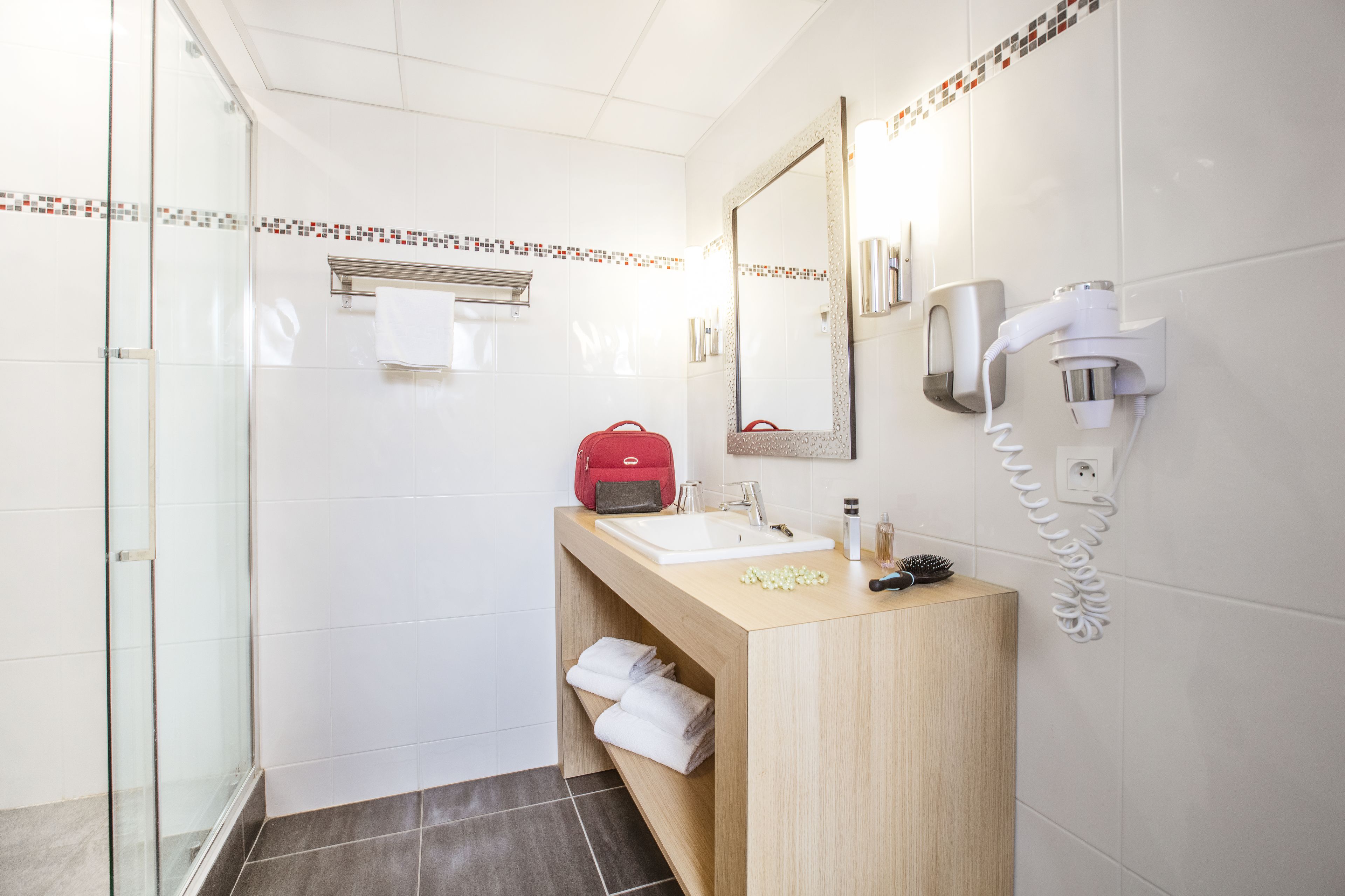 shower, free toiletries, hair dryer, towels