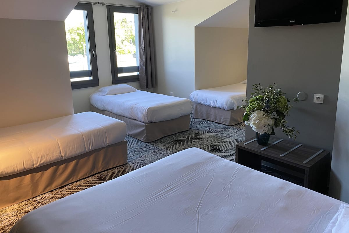 Premium bedding, desk, laptop workspace, blackout curtains