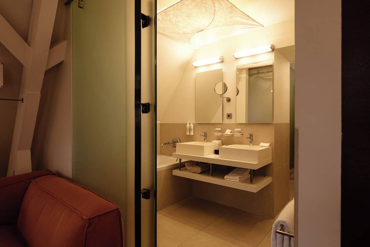 signature | bathroom | combined shower/bathtub, free toiletries, hair dryer, bathrobes