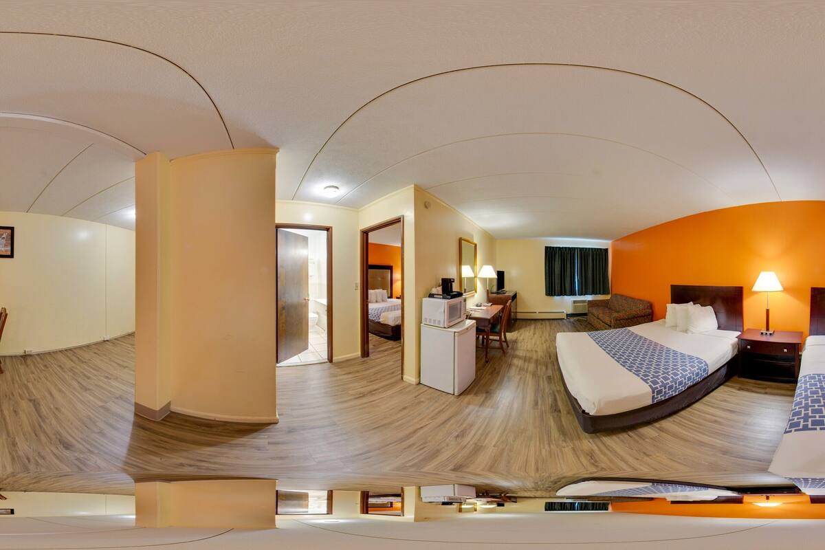 desk, laptop workspace, blackout curtains, free cots/infant beds