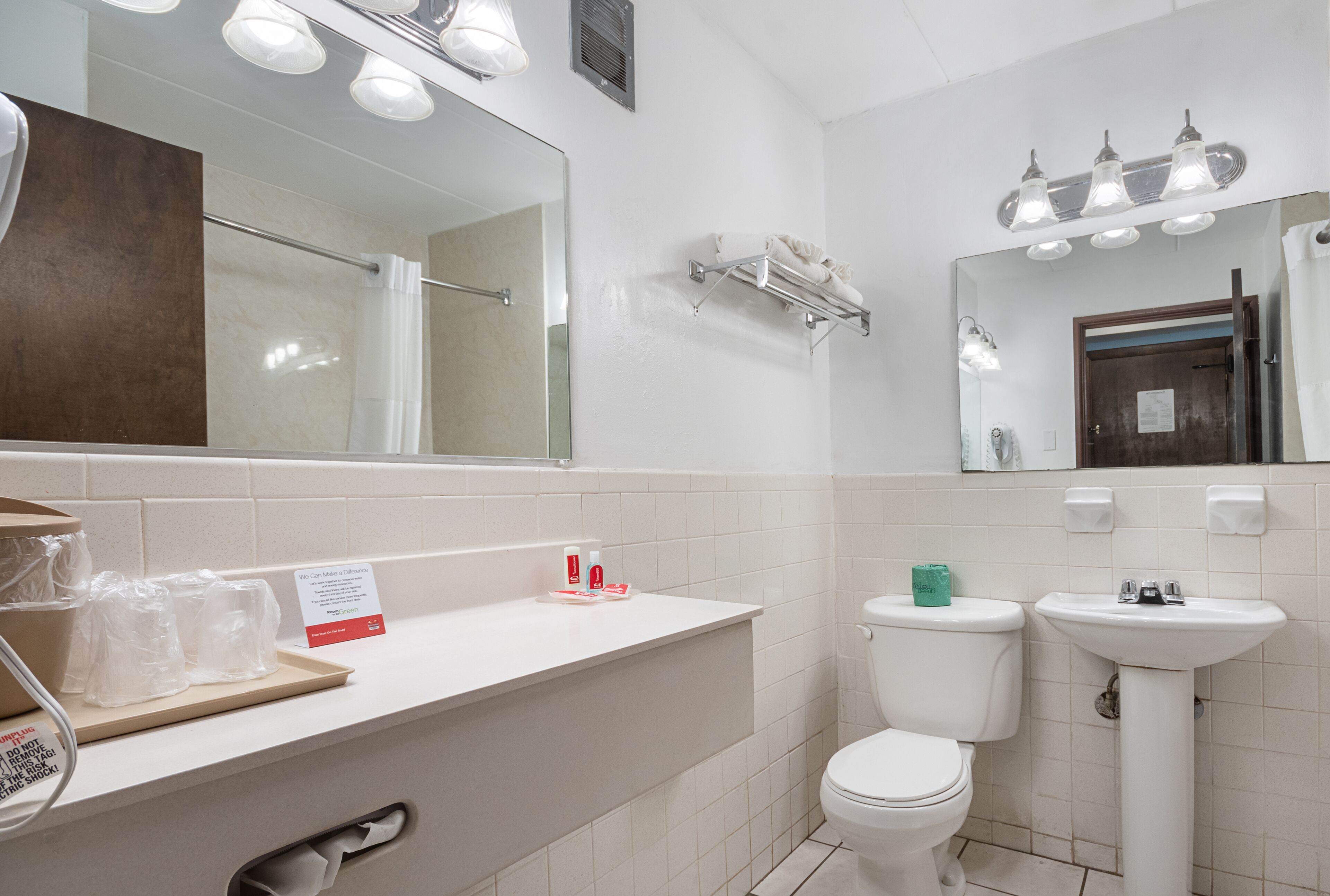 hair dryer, towels, soap, shampoo