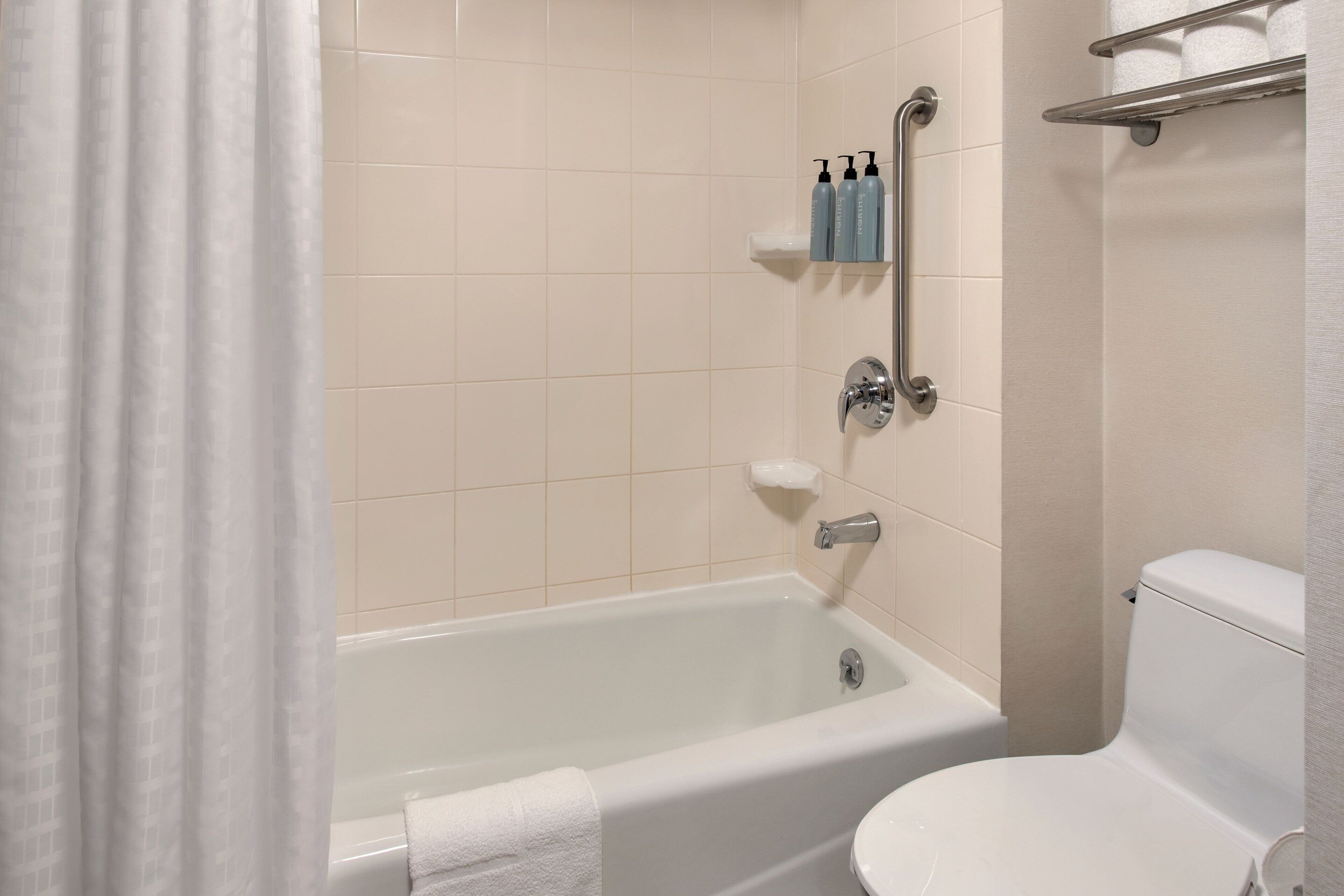 combined shower/bathtub, free toiletries, hair dryer, towels