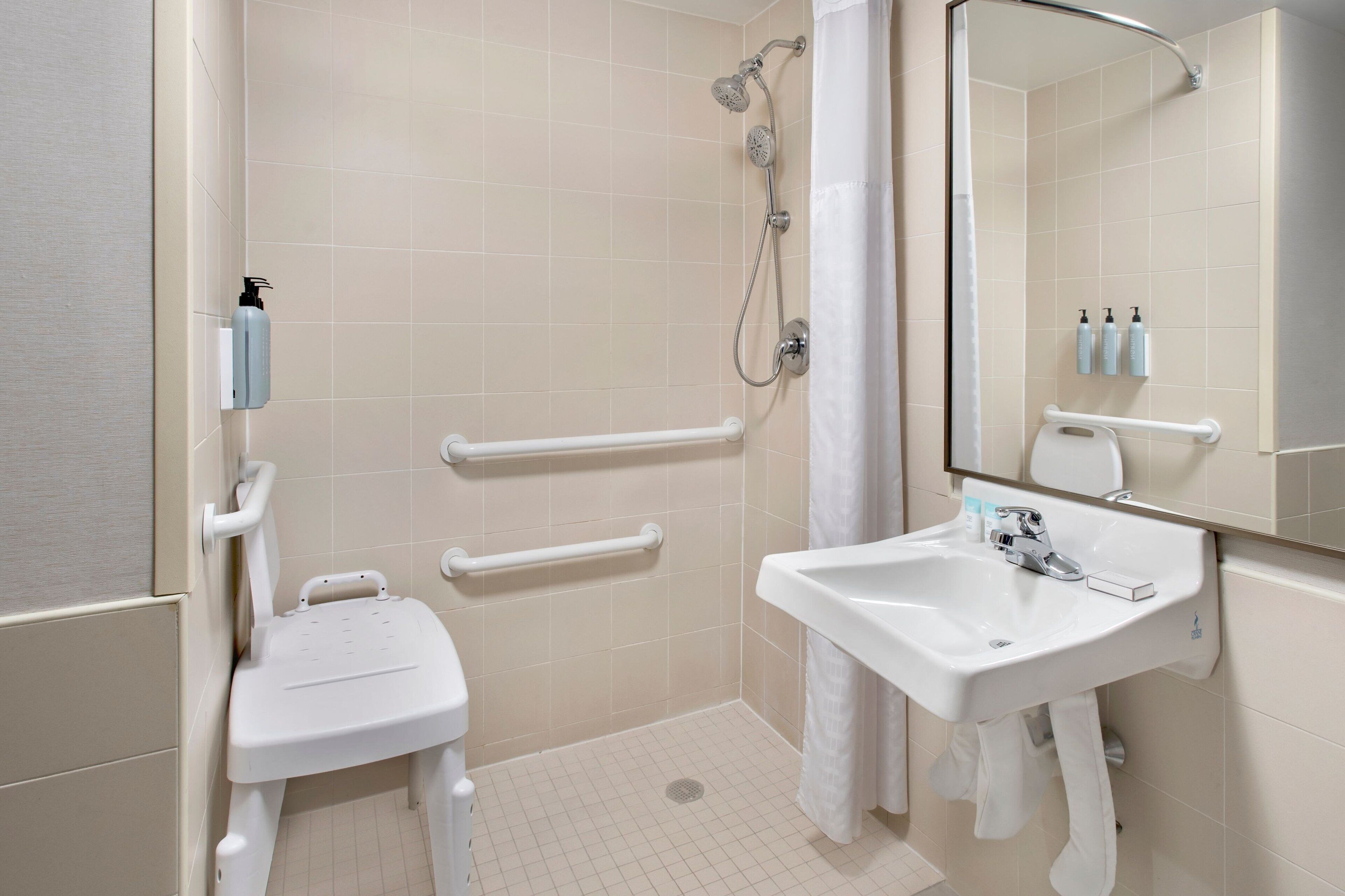 combined shower/bathtub, free toiletries, hair dryer, towels