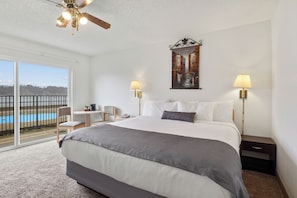 King Pool View w/Patio | Blackout drapes, iron/ironing board, free WiFi, bed sheets