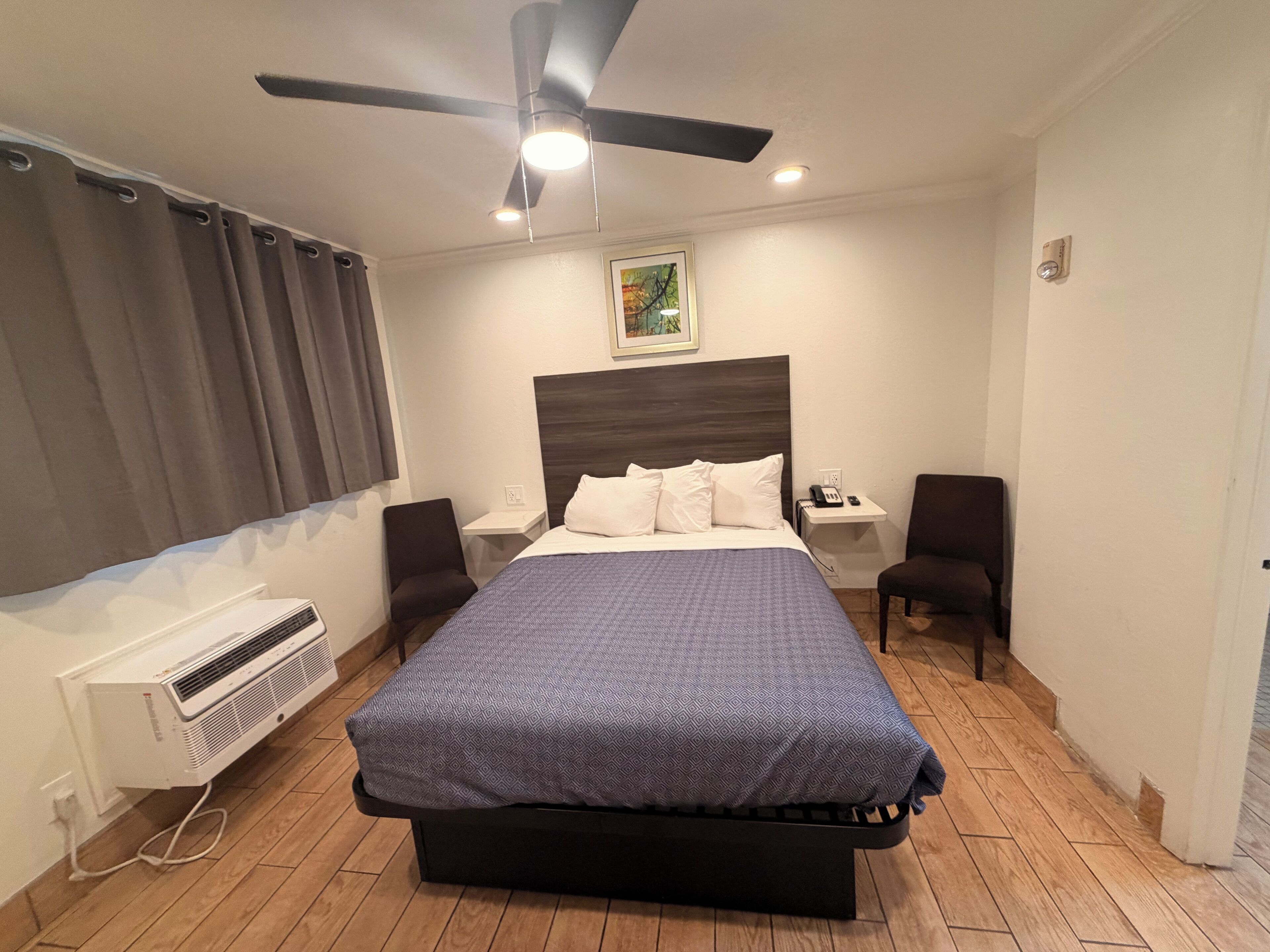 Basic Single Room, 1 Queen Bed, Accessible | Iron/ironing board (on request), WiFi (free), bed sheets