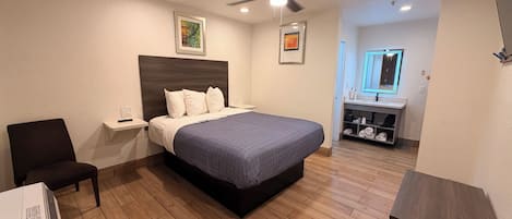 Standard Room, 1 Queen Bed | Iron/ironing board (on request), WiFi (free), bed sheets