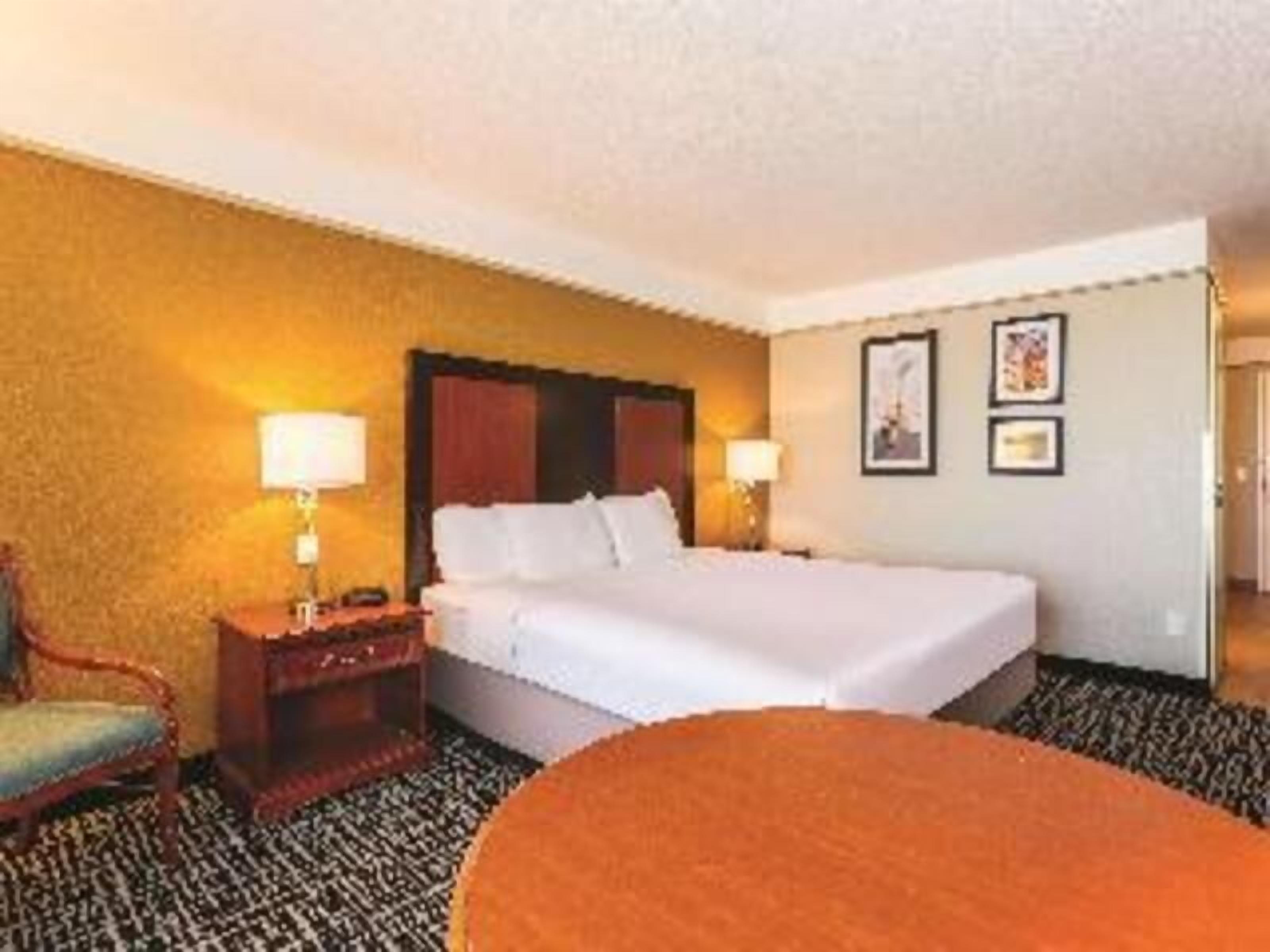 Premium bedding, desk, blackout drapes, iron/ironing board