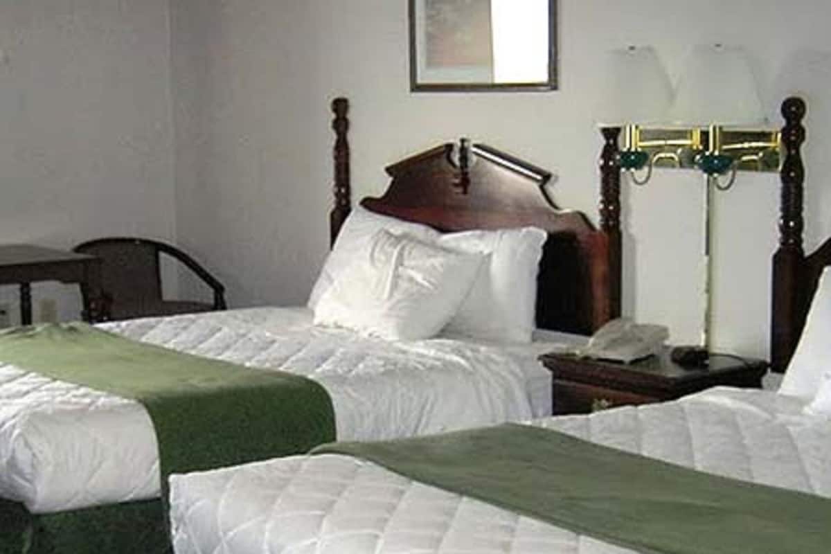 Desk, free WiFi, bed sheets, alarm clocks
