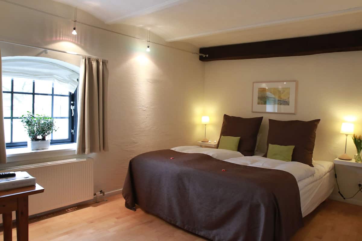 Desk, blackout drapes, iron/ironing board (on request), WiFi (free)