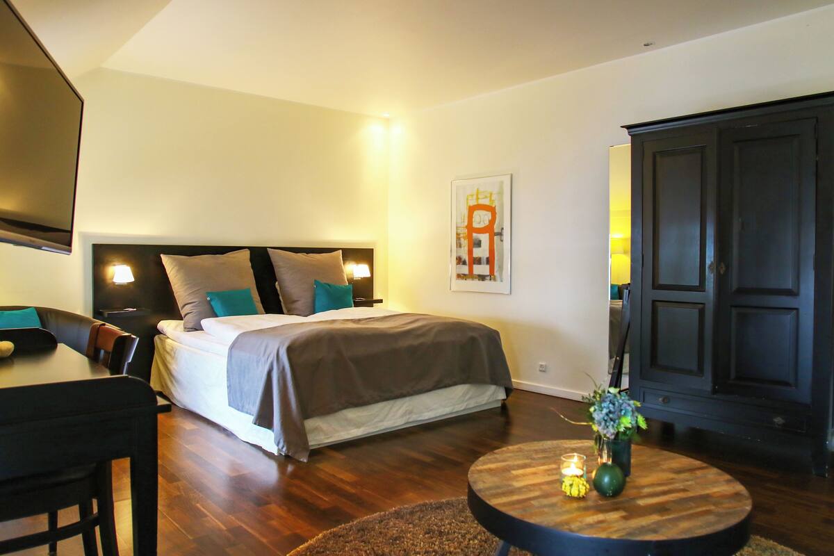 Desk, blackout drapes, iron/ironing board (on request), WiFi (free)