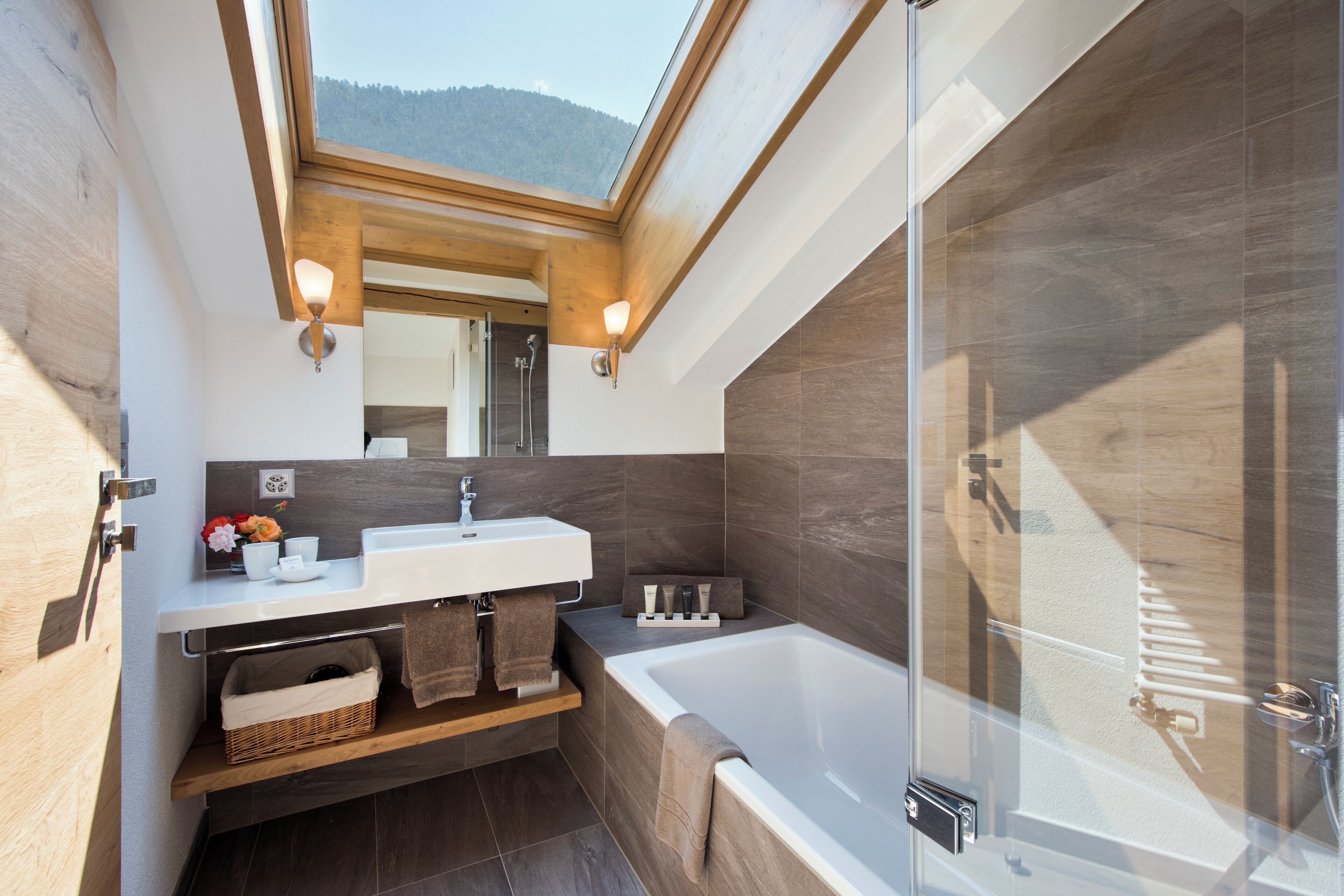alpine roof suite | bathroom | combined shower/bathtub, free toiletries, hair dryer, slippers