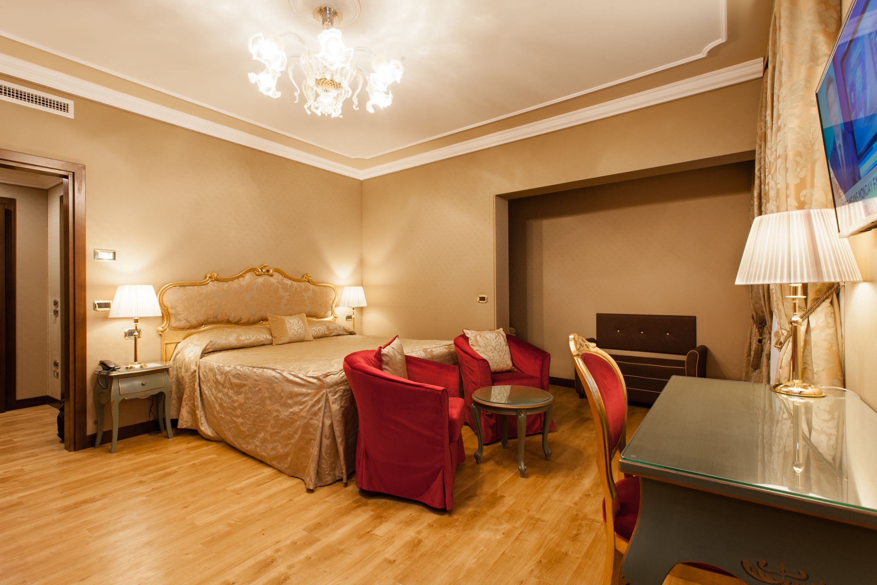 junior suite | living area | 20-inch lcd tv with satellite channels, tv