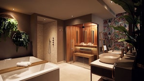 Een moderne badkamer met een ruime badkuip, een houten wastafelmeubel en een douchehoek.