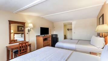 Desk, blackout curtains, iron/ironing board, rollaway beds