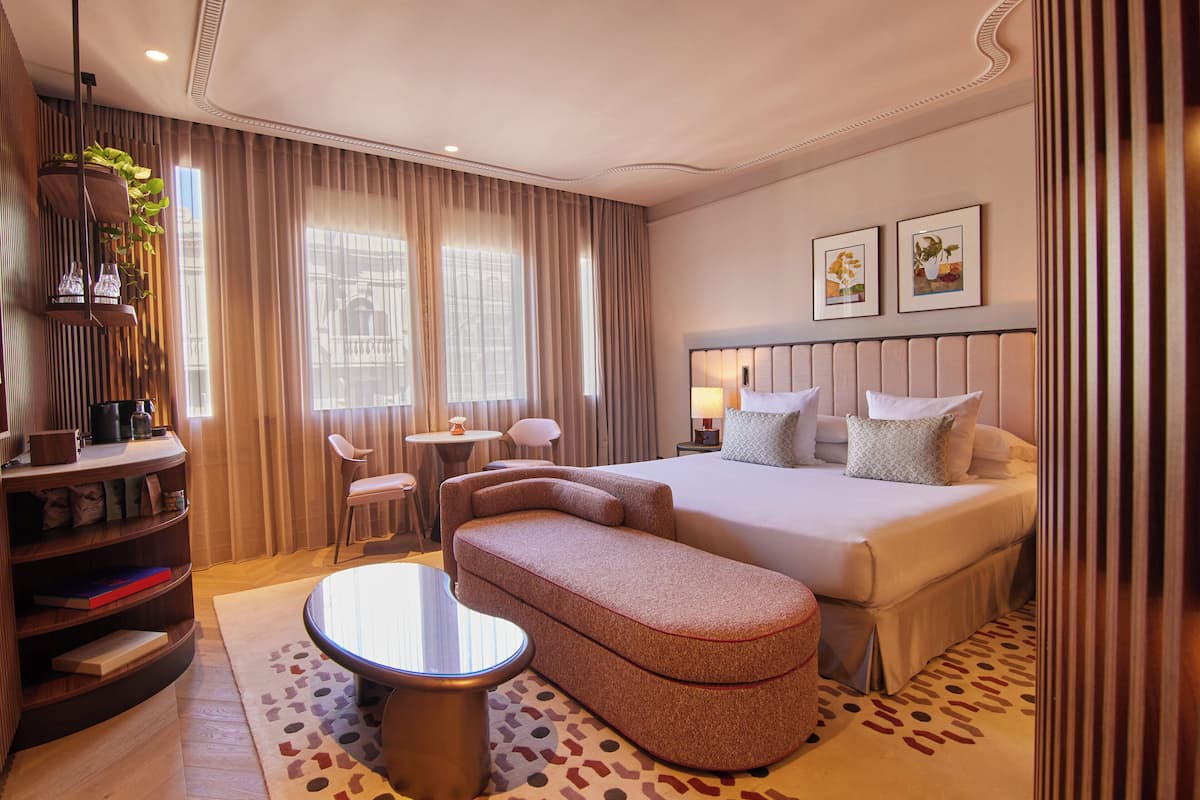 Junior Suite | 1 bedroom, premium bedding, minibar, in-room safe
